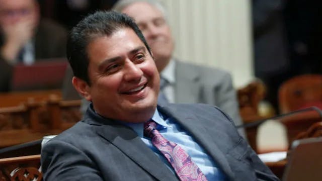 Hueso Raised Energy & Tobacco Money, Then Passed Funds to Gomez Campaign